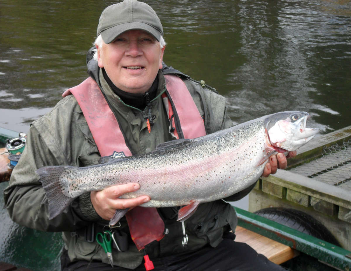 Stuart Thom proudly shows off one of Monikie's biggest catches at 9 lb 7 oz. Photo by George Potts.